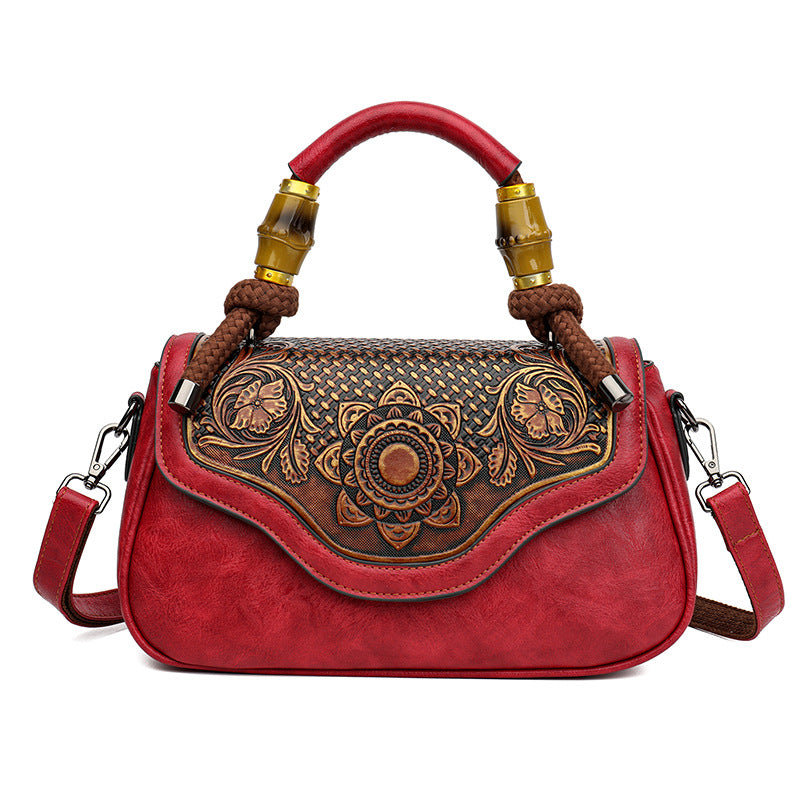 Sac crossbody cuir embossé vert