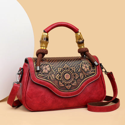 Sac crossbody cuir embossé bordeaux