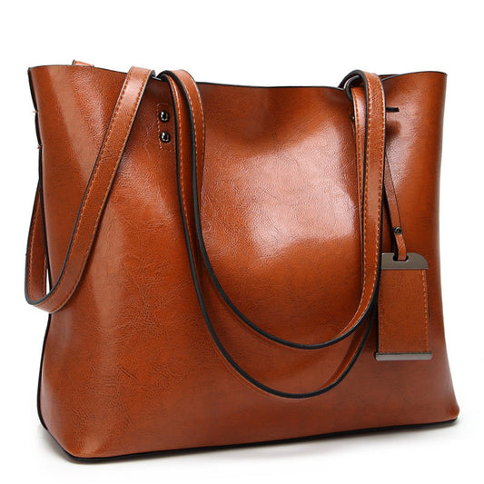 Sac seau cuir huilé vintage noir épaule