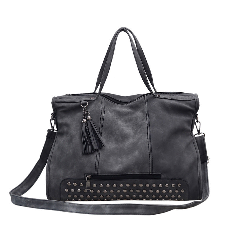 Tote rivets vintage noir Régine Vogalia Paris
