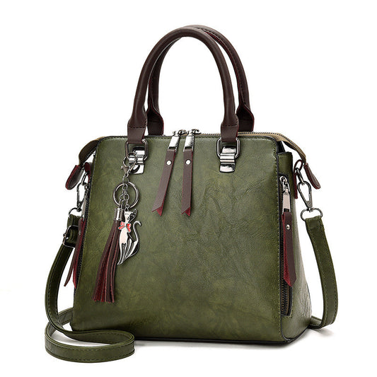 Sac main vintage PU glands noir luxe