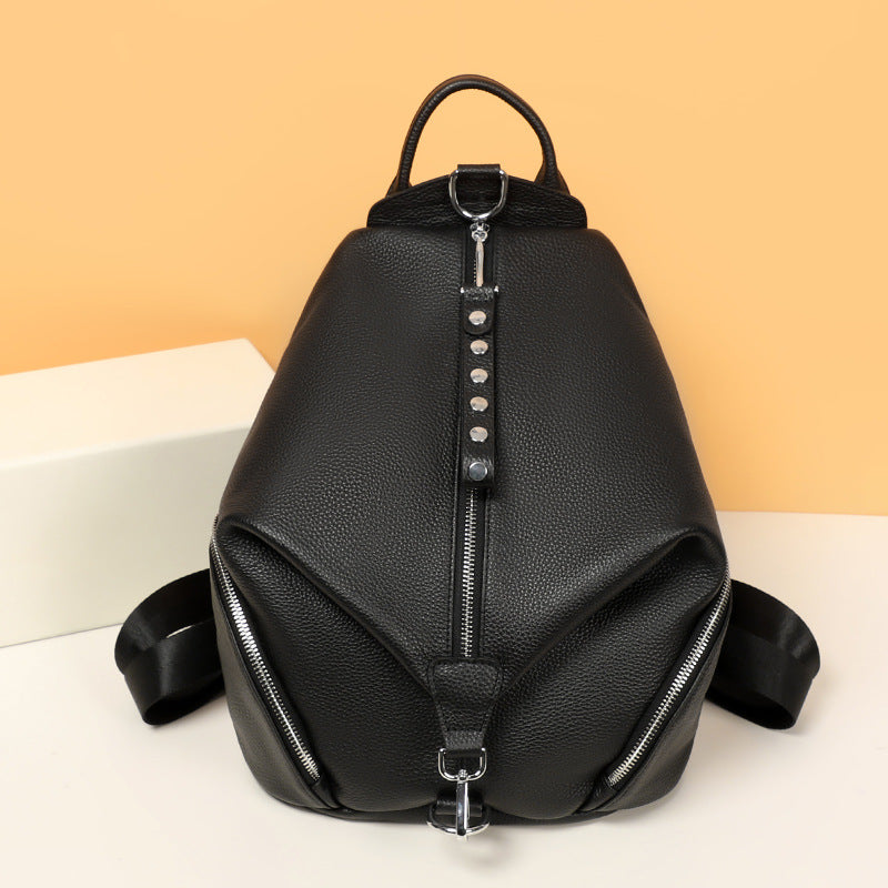 Gros plan texture cuir véritable première couche vache qualité premium sac Geneva