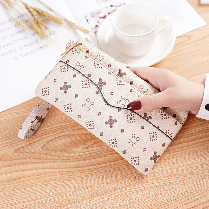 Pochette femme imprimée marron beige