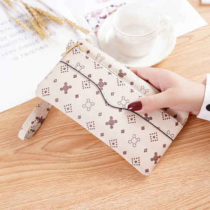 Pochette femme imprimée marron beige