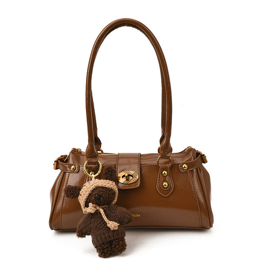 Sac épaule commuter noir avec pendentif