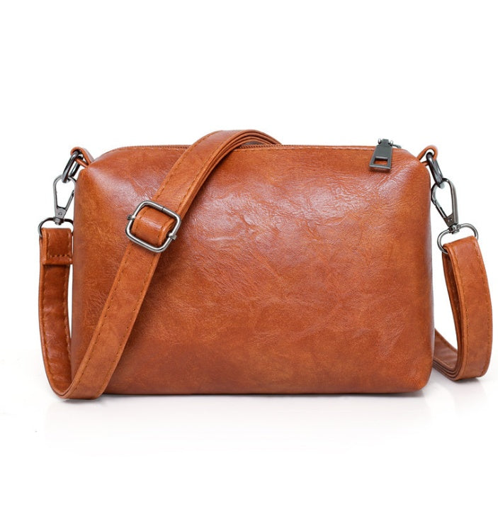 Poignée souple et bandoulière réglable sac épaule PU noir femme, double mode de port

