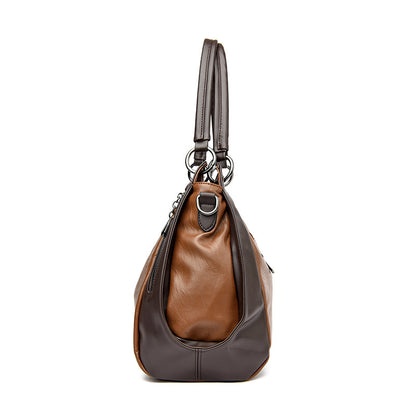 Sac cabas noir classique cuir souple porte main elegance intemporelle