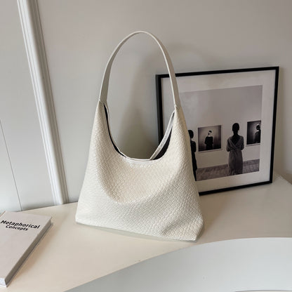 Sac tressé embosse kaki
