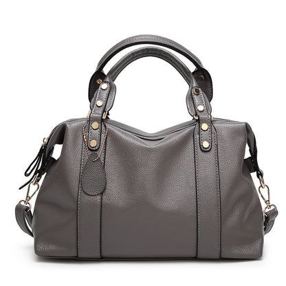 Sac boston rivets noir crossbody