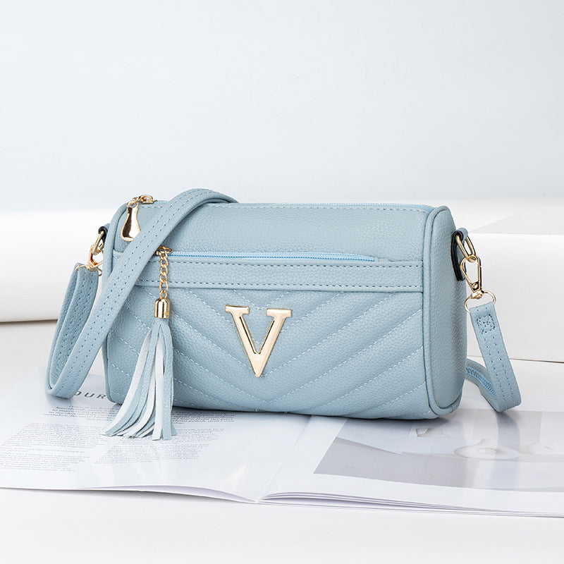 Ysaline brun jaune blanc détail clasp V
