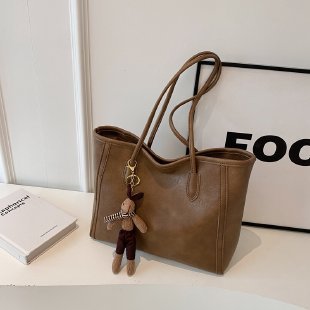 Sac unisexe taupe beige terreux neutre moderne avec pendentif