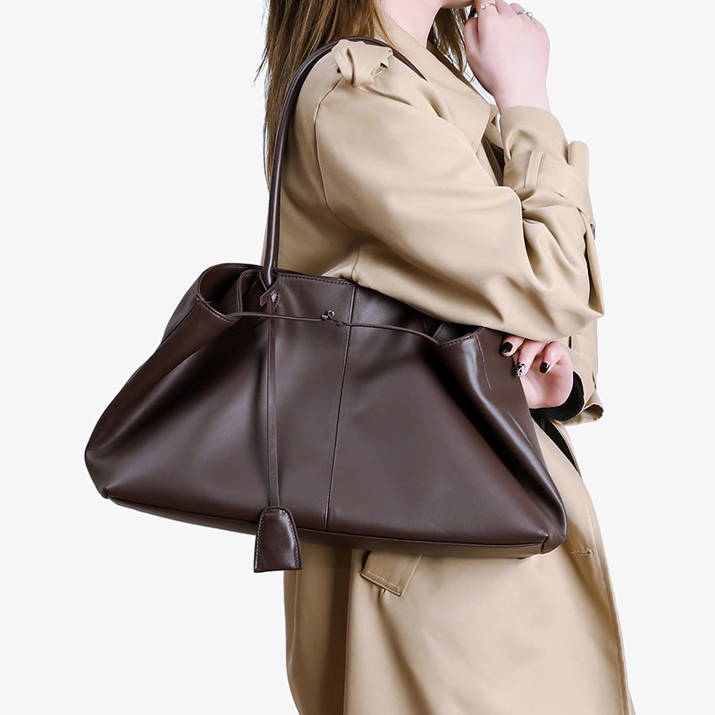 Uma crossbody beige niche designer