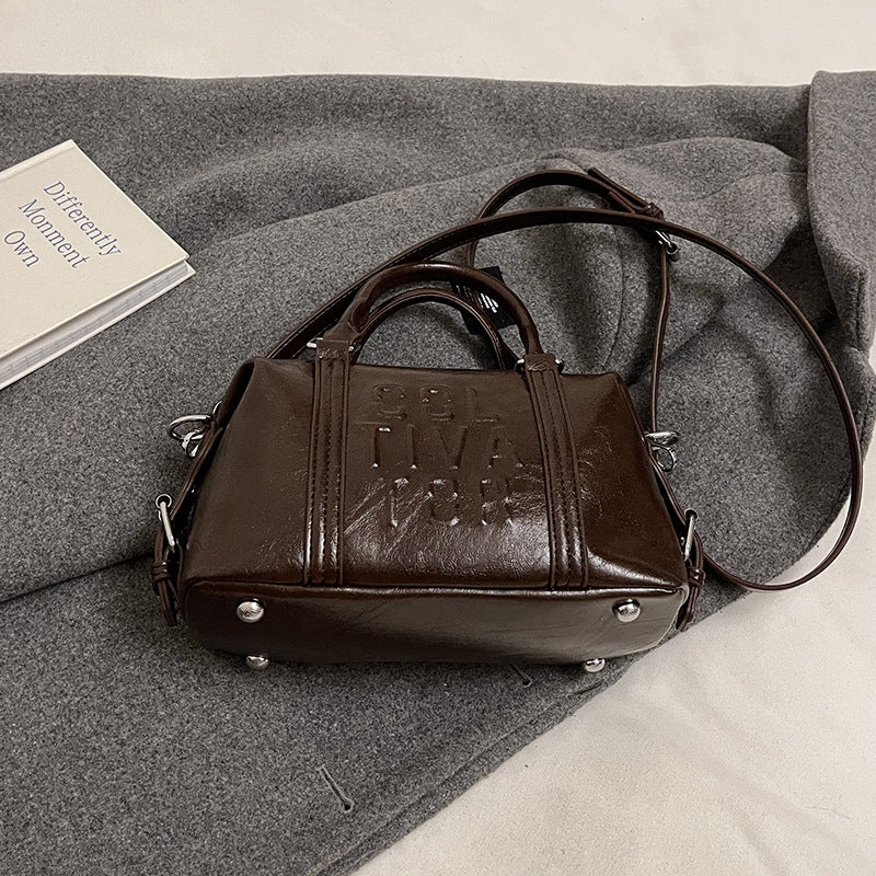 Sac commuter noir avec nœud
