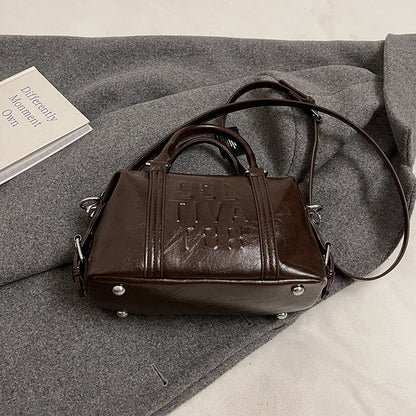 Sac commuter noir avec nœud