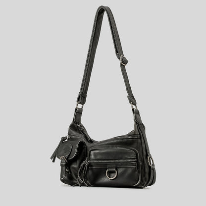 Détail texture cuir PU premium qualité du sac vintage style motard femme