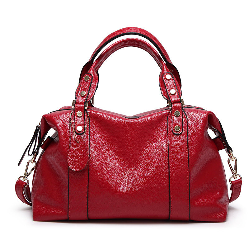 Sac boston rouge rétro