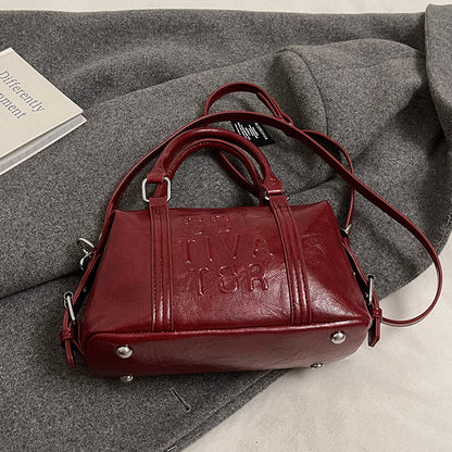 Sac commuter rouge pourpre