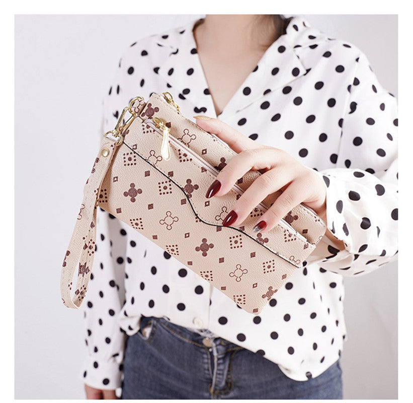 Pochette femme imprimée compartiments intérieurs