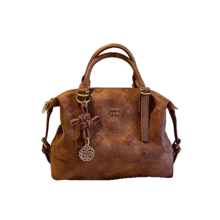 Sac losange marron portable