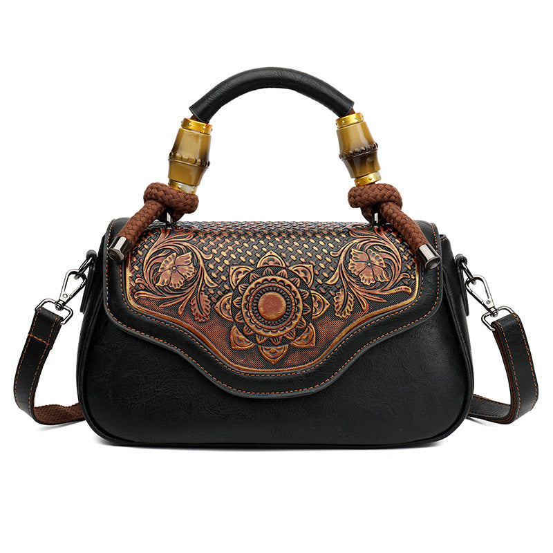 Sac crossbody cuir embossé noir artisanal