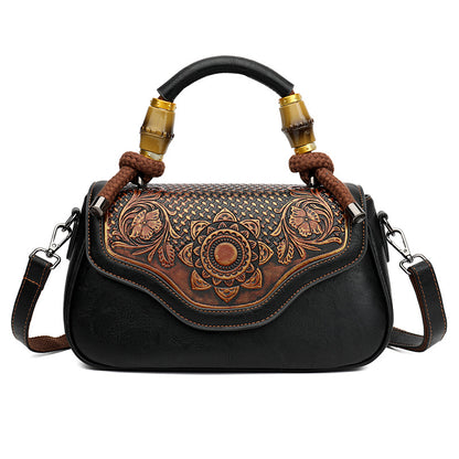 Sac crossbody cuir embossé noir artisanal