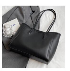 Sac main marron brun chaleureux classique vintage élégant femme automne